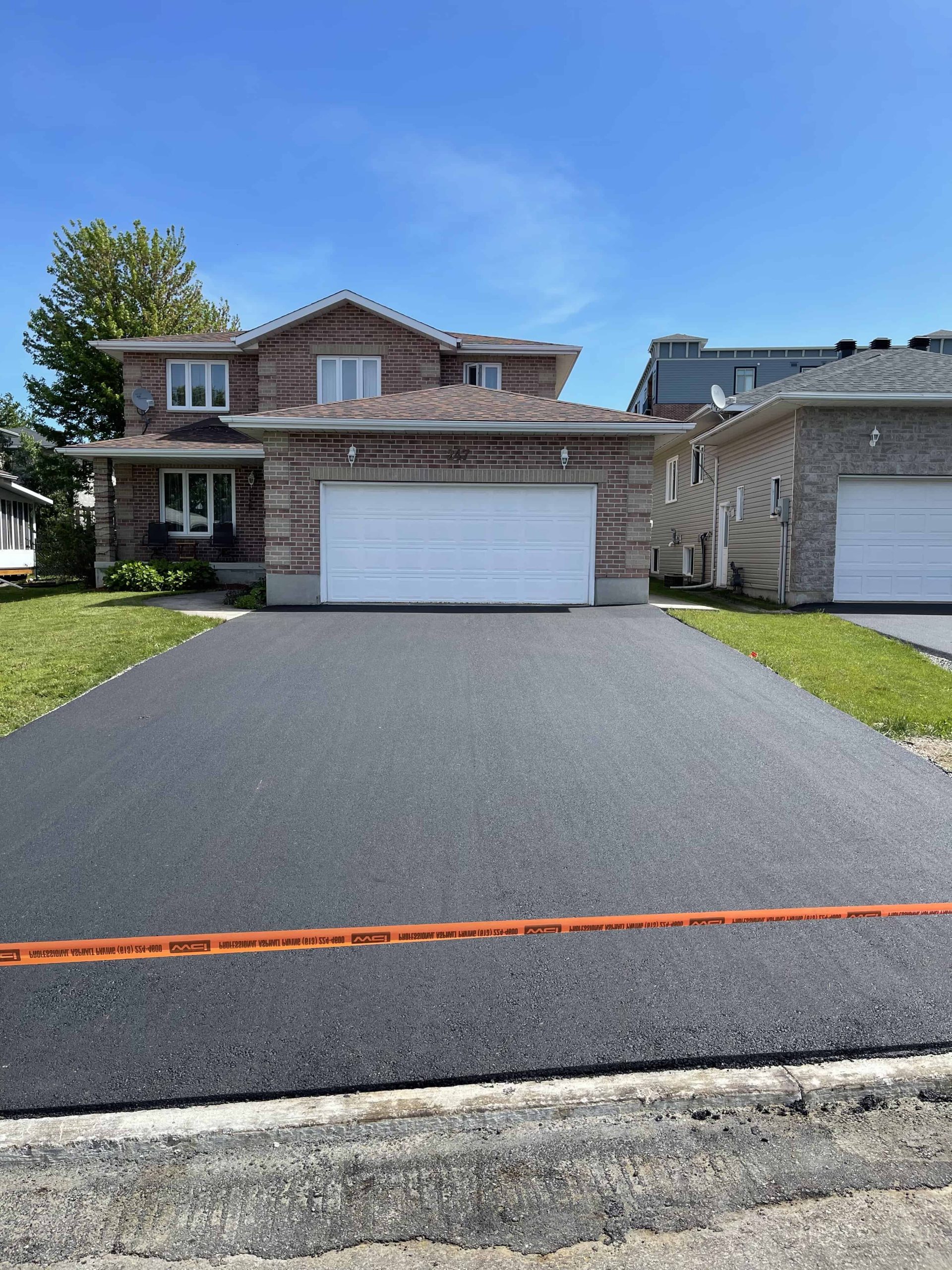 New asphalt driveway installation in Ottawa
