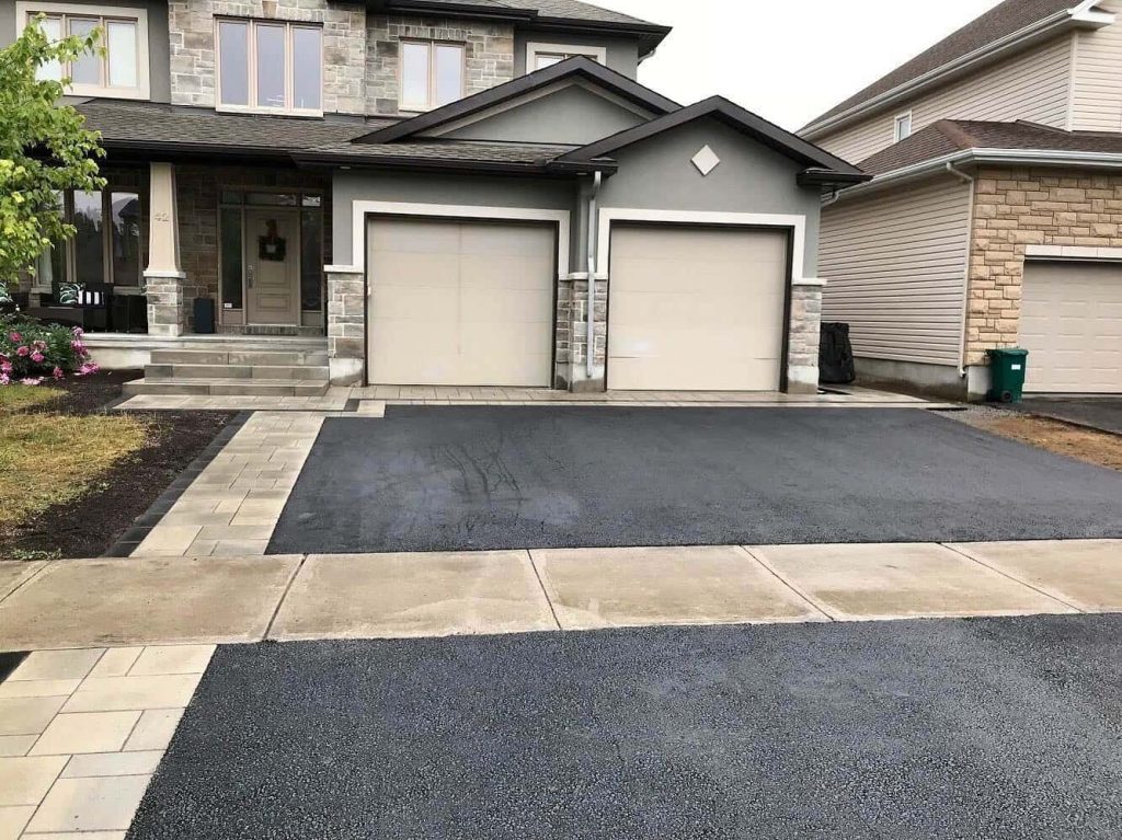 Newly paved asphalt driveway at Ottawa home