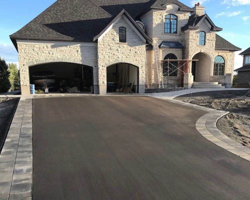 Large residential asphalt driveway paving project in Ottawa