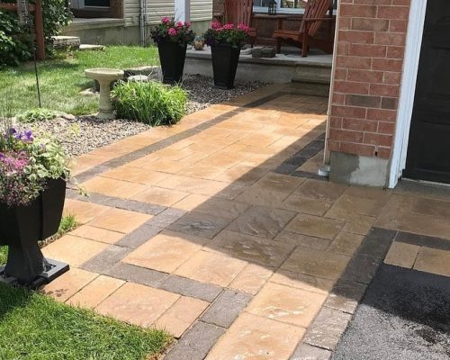 Decorative interlock walkway and front entrance project by WCI
